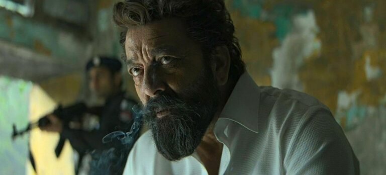 An intense action-packed moment from Dhurandhar 2: Revenge (March 19, 2026) featuring a fierce confrontation and a dark, high-stakes revenge-driven atmosphere.