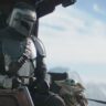 A cinematic sci-fi scene from The Mandalorian & Grogu, showing a lone armored bounty hunter and his small Force-sensitive companion journeying through a vast galaxy filled with danger and adventure. top Hollywood movies 2026