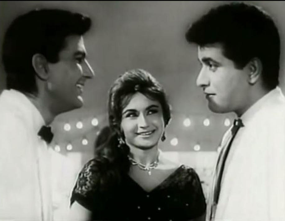 An eerie black-and-white scene from Woh Kaun Thi? (1964) showing a mysterious woman in a haunting setting, capturing the film’s chilling, suspenseful, and atmospheric classic thriller tone.