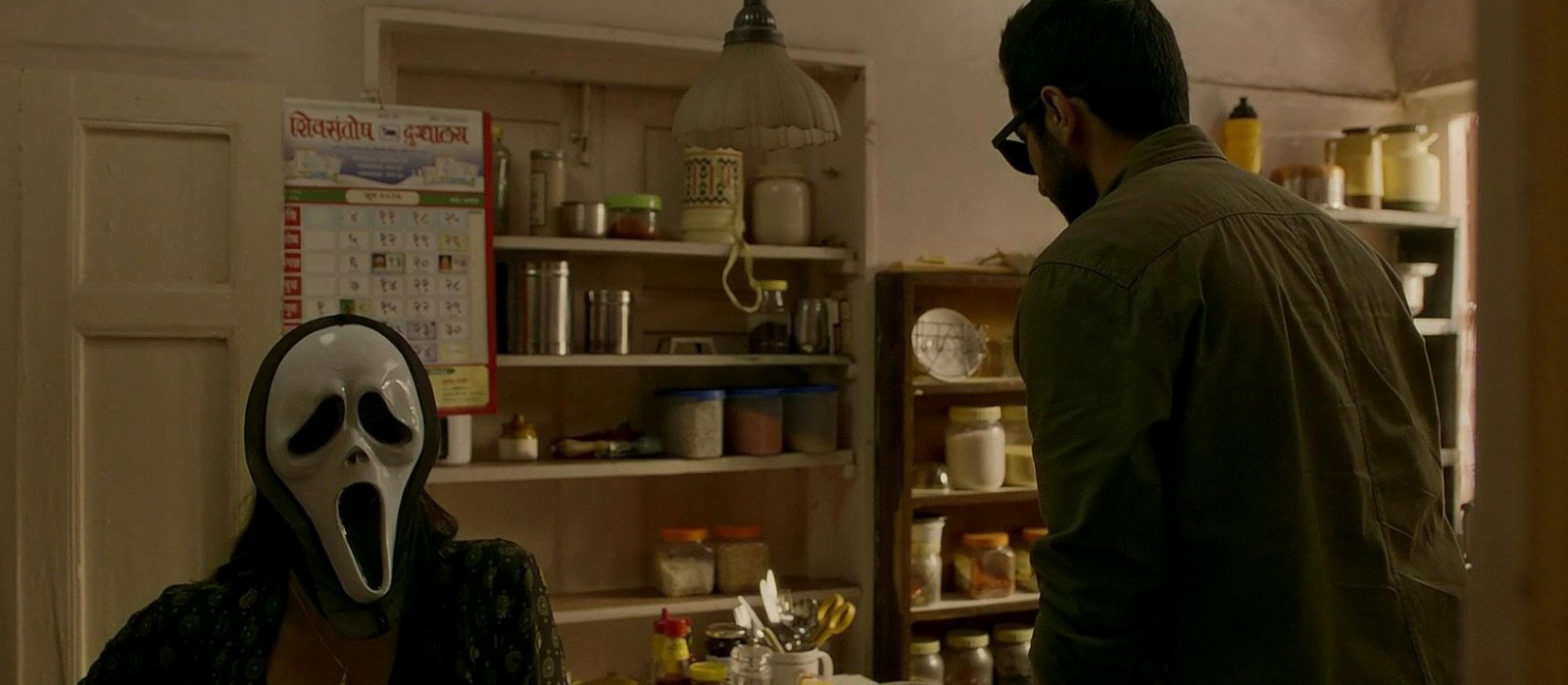 A tense, suspense-filled moment from a thriller film, featuring a dramatic atmosphere, heightened emotions, and a sense of mystery and anticipation