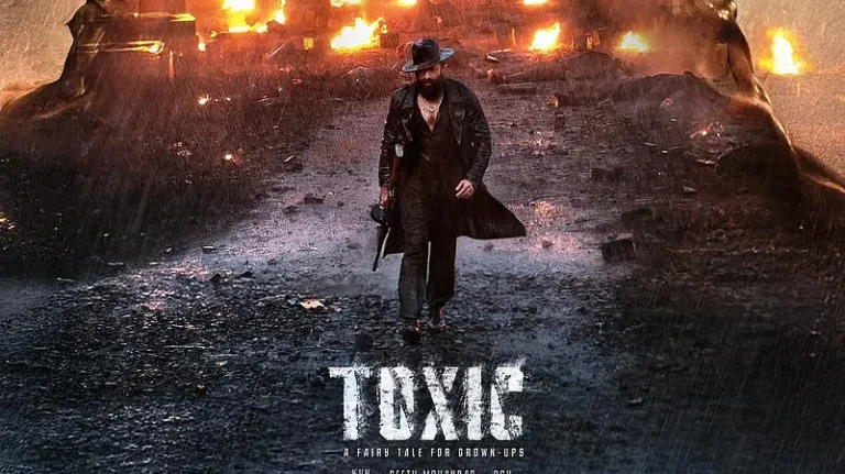 Yash strides through a rain-soaked, fire-lit street in the intense poster of Toxic, showcasing a dark, high-stakes action mood. Yash Toxic Release Date